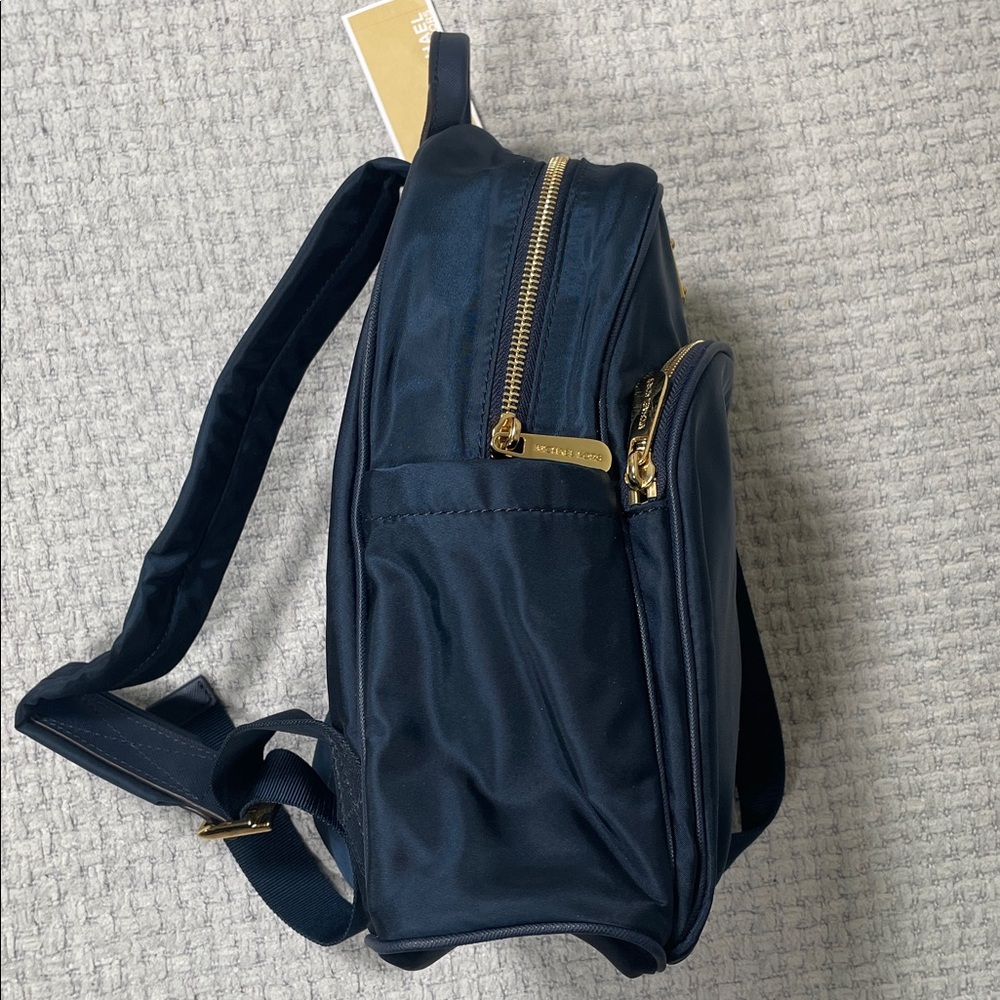 NWT’s Micheal Kors Jet Set Navy Blue Gold Backpack Bag Travel Pockets - Picture 7 of 16